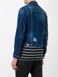 stonewashed distressed denim jacket