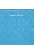 embossed zipped clutch