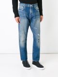 splattered tapered jeans