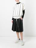 exposed seam pleated skirt