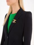 logo brooch