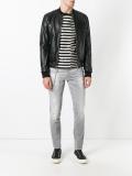 Slim distressed chain jeans