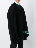 V-neck frayed poncho