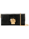 gold buckle clutch bag