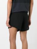 over-the-knee frayed shorts
