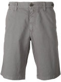 shorts with button closure flap pockets