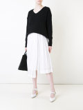 bouclé jumper with asymmetric hem