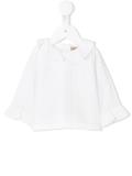 ruffled blouse