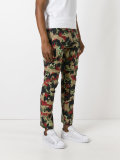 camouflage print trousers 