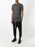 drop-crotch track pants