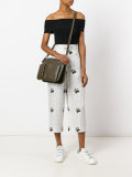 Pocket bandoleer shoulder bag