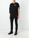 elongated strappy skinny jeans