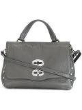 fold-over closure crossbody bag