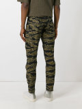 camouflage print trousers 