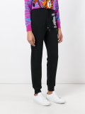 hamsa hand trackpants