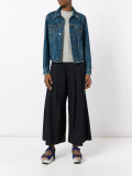 flared pleated trousers
