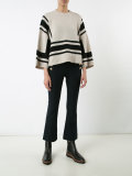 buttoned high-waisted trousers
