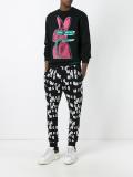 all-over logo print track pants