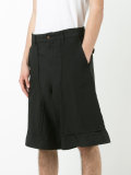 wide-legged drop-crotch bermudas