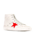 star patch distressed trainers