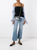 face shaped crossbody bag