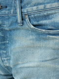 distressed denim jeans