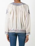 embroidered figures blouse