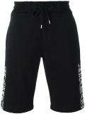goth tattoo print track shorts