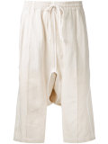 drop-crotch track shorts