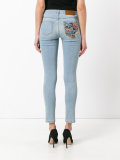 floral patch skinny jeans