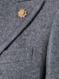 peaked lapel coat