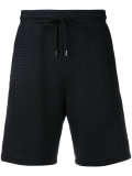 woven track shorts