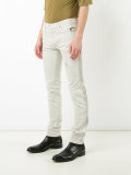 distressed slim jeans