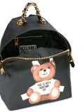 toy bear paper cut out print backpack