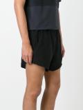 over-the-knee frayed shorts