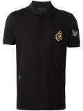 embroidered patch polo shirt
