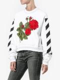 rose-embroidered sweatshirt