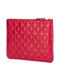 embossed zipped clutch