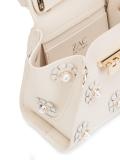 'Earthy Iconic Top Handle'迷你花卉斜挎包