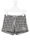 checked swim shorts 