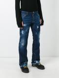 Ski distressed flared jeans