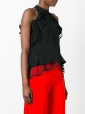 ruffled sleeveless blouse