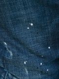 distressed tapered jeans