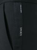high-waisted trousers