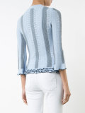 cut-out ruffle hem top