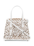 perforated floral shoulder bag