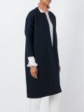 long overlapping collarless coat