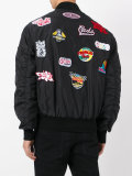 patched bomber jacket