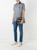 Palazzo Medusa text scroll clutch