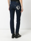 lion head skinny jeans 